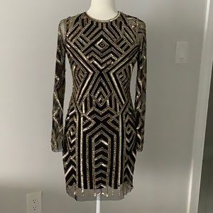 Black and gold sequin dress